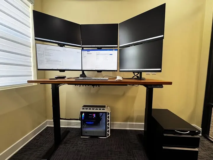 Multi monitor desk setup of a vibe coder workstation